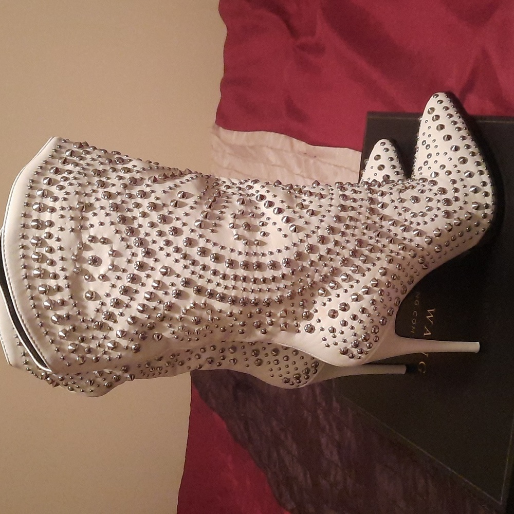 A white studs bootie ,